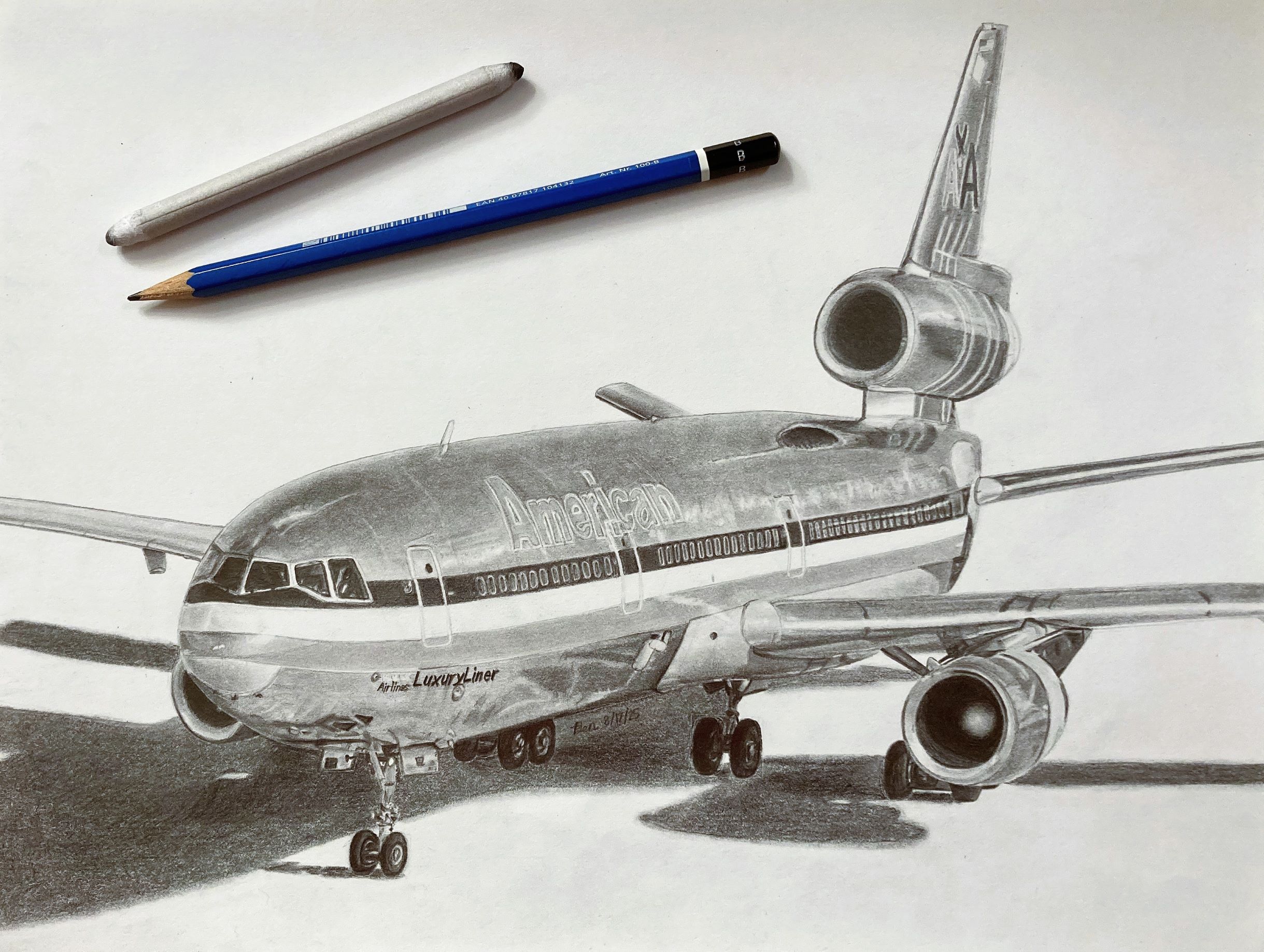 Grayscale drawing of American Airlines DC-10, front view
